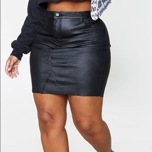 Black Coated denim mini skirt